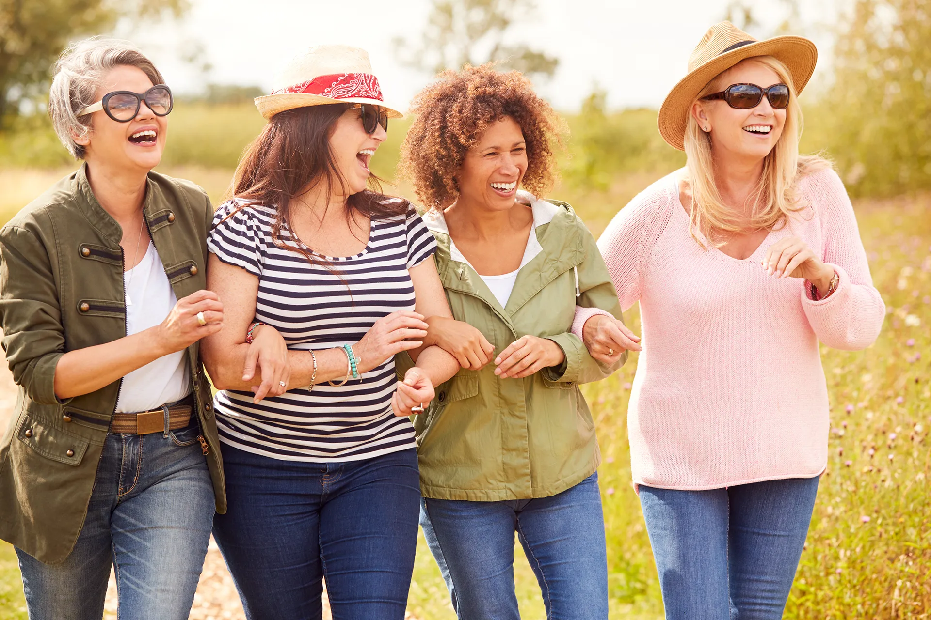 Group of Women Walking and Laughing Together