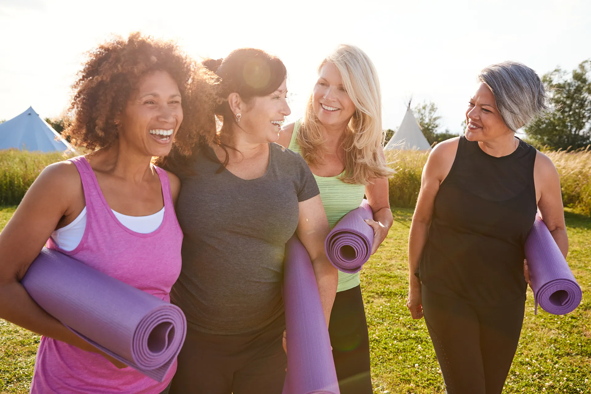 Four Women Enjoying Yoga Together